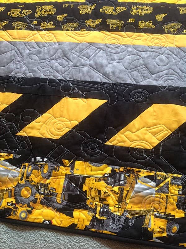 construction-quilt-front.caterpillar heavy hauler quilt panel, truck panel, quilting, craft, sewing